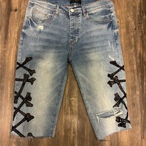 AMIRI Blue Jean Shorts with Black Cross Details